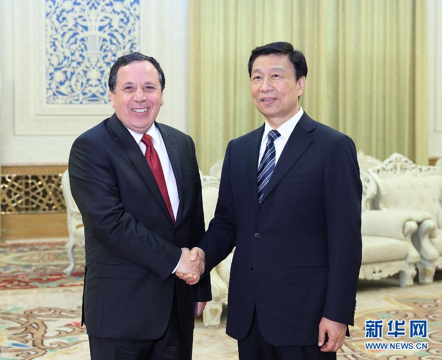 7月20日，國家副主席李源潮在北京會(huì)見突尼斯外長(zhǎng)杰希納維。新華社記者王曄攝