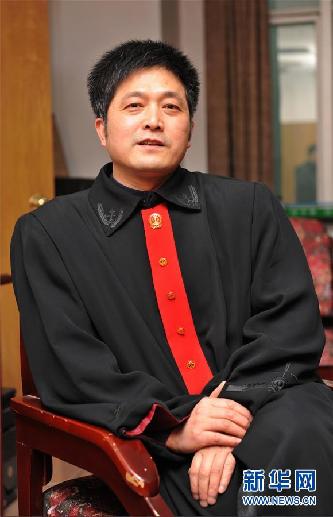 （圖文互動(dòng)）其人如蘭，既潔且馨——追記“全國模范法官”胡國運(yùn)