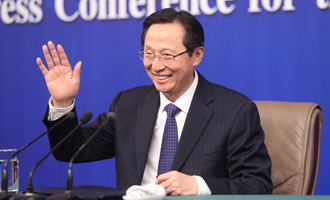 農業部部長韓長賦向記者舉手示意