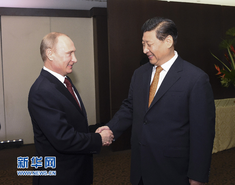 7月14日，國家主席習(xí)近平在巴西福塔萊薩會見俄羅斯總統(tǒng)普京。新華社記者李學(xué)仁攝