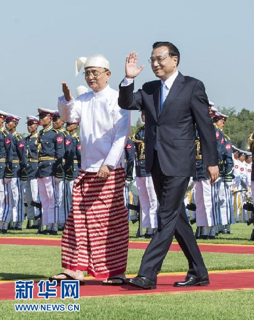 11月14日，中國國務院總理李克強在內比都同緬甸總統吳登盛舉行會談。這是會談前，吳登盛在緬甸總統府前廣場為李克強舉行隆重的歡迎儀式。新華社記者 王曄 攝