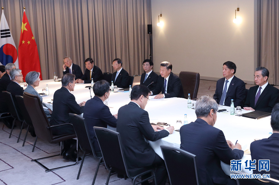 7月6日，國家主席習(xí)近平在柏林會見韓國總統(tǒng)文在寅。 新華社記者 王曄攝